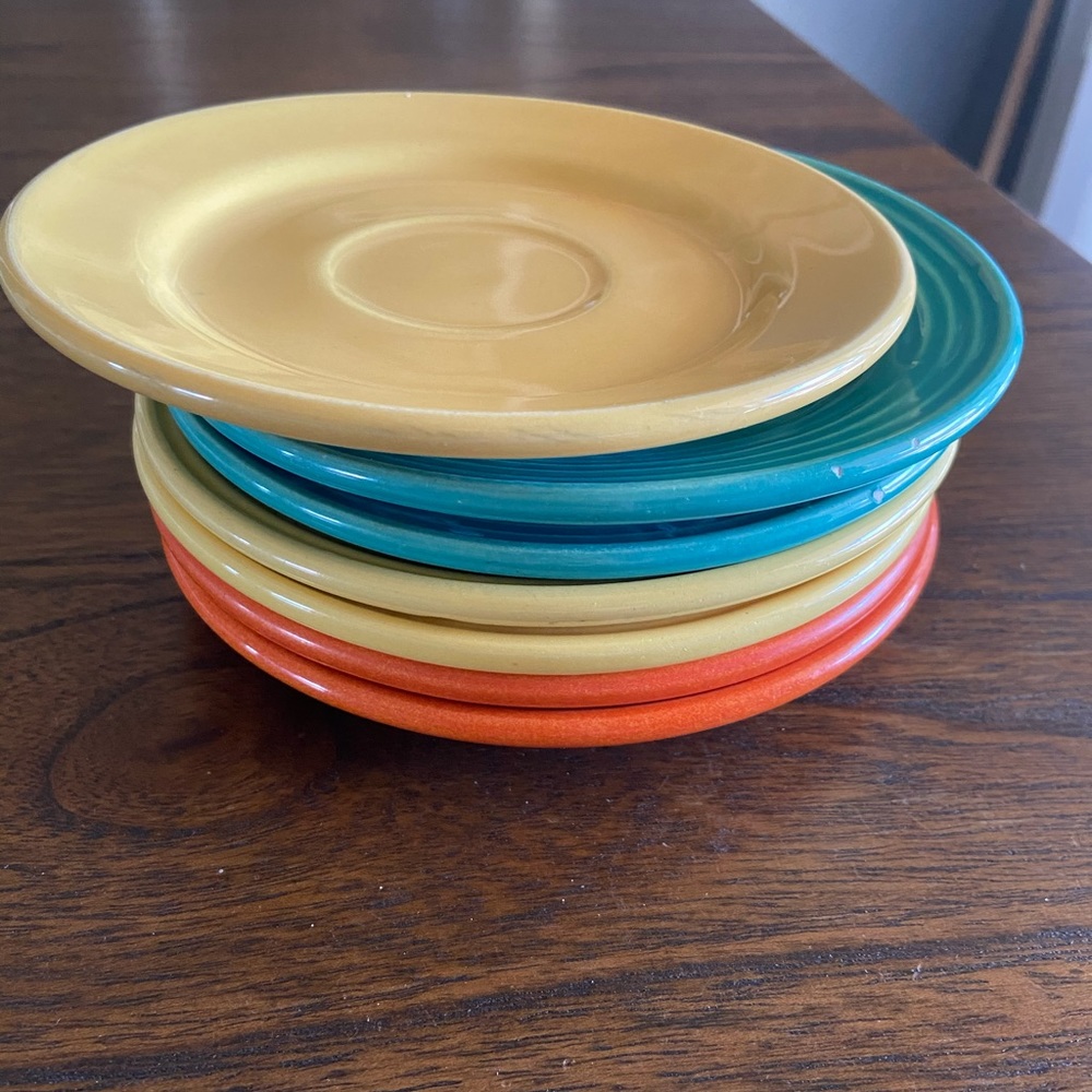 Set of 7 Bauer Los Angeles saucers